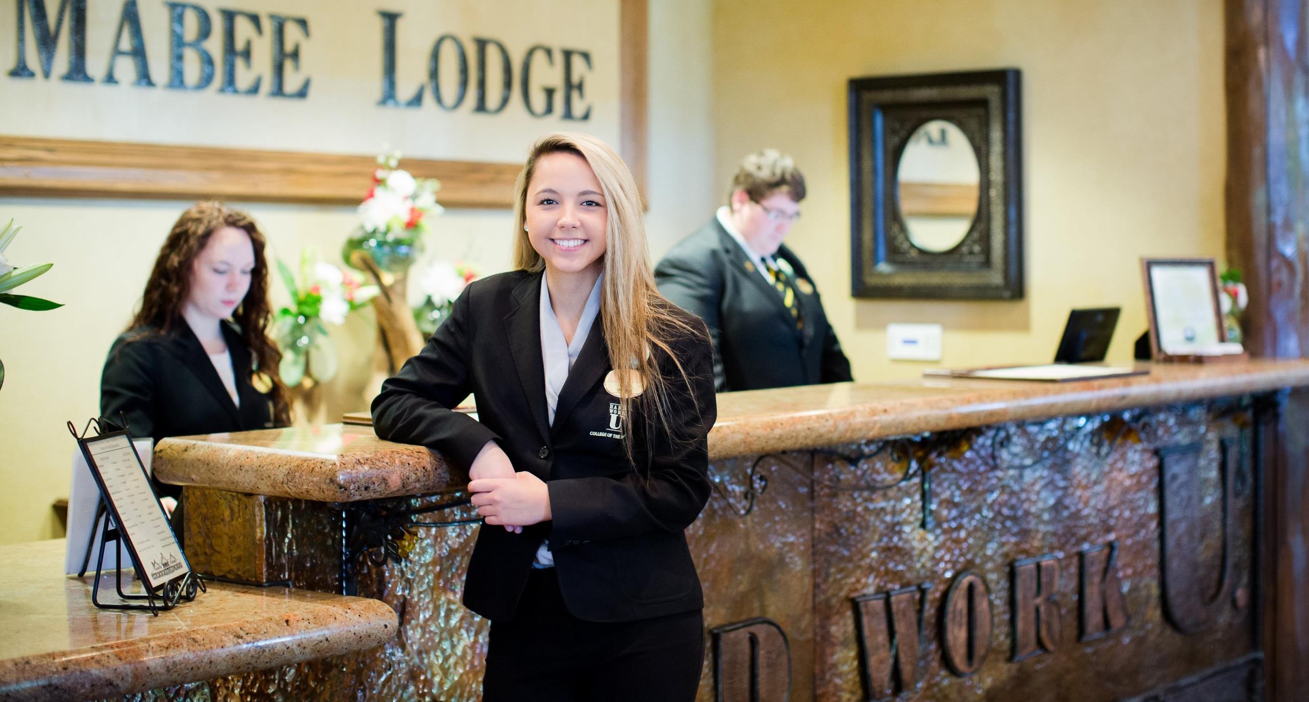 Students working at The Keeter Center front desk.